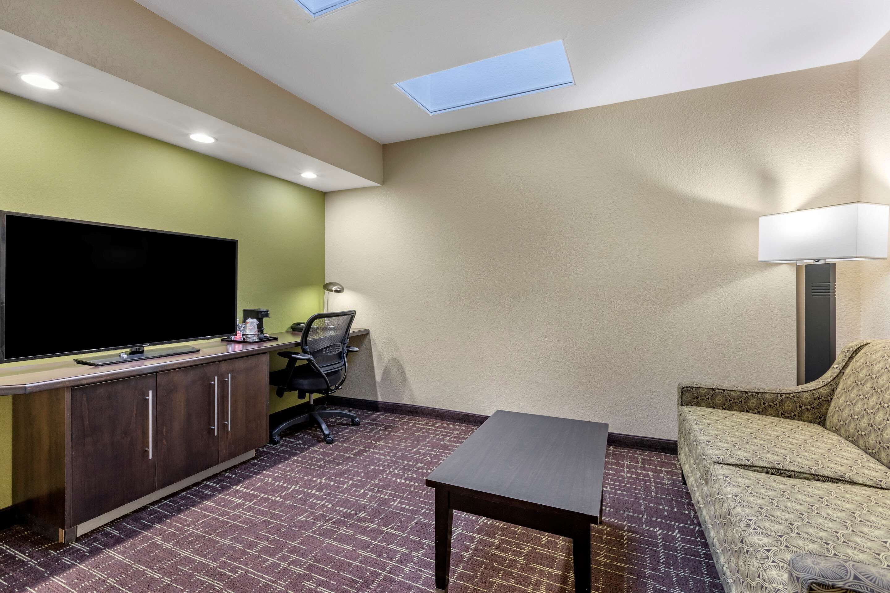 suite, 1 king bed with sofa bed, non smoking | premium bedding, pillow-top beds, laptop workspace, blackout curtains