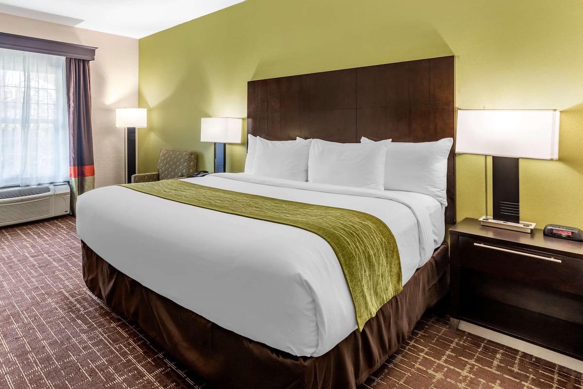 Premium bedding, pillow-top beds, laptop workspace, blackout curtains