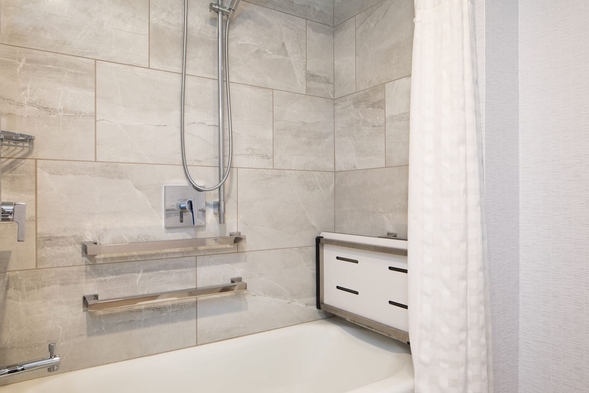 shower, free toiletries, hair dryer, towels