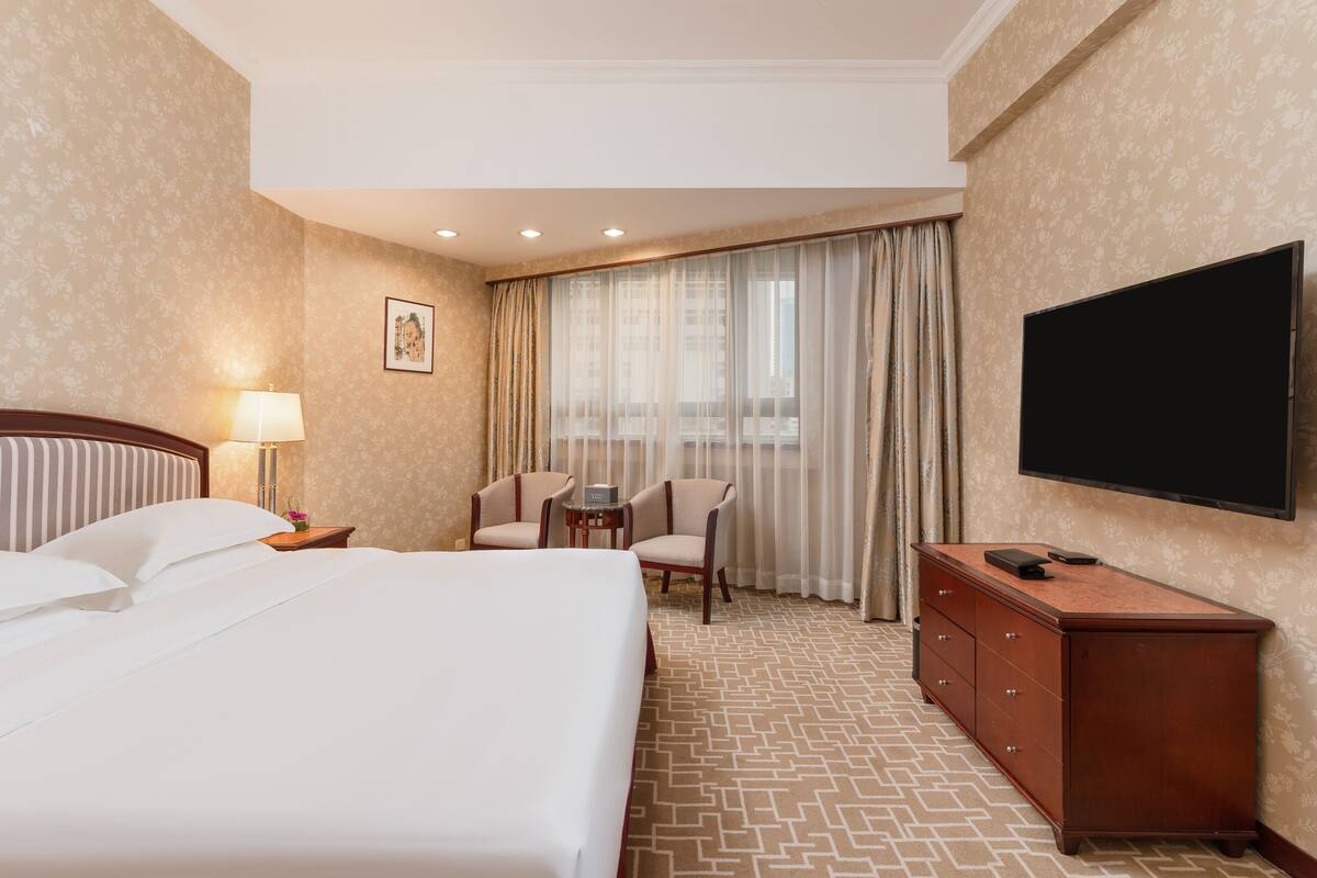 Suite – deluxe | Minibar, safe på rommet, blendingsgardiner og lydisolert