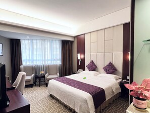 Rom – executive | Minibar, safe på rommet, blendingsgardiner og lydisolert