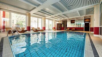 Indoor pool, open 7:00 AM to 9:00 PM, pool loungers