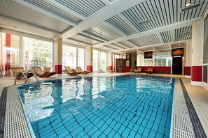 Indoor pool, open 7:00 AM to 9:00 PM, pool loungers