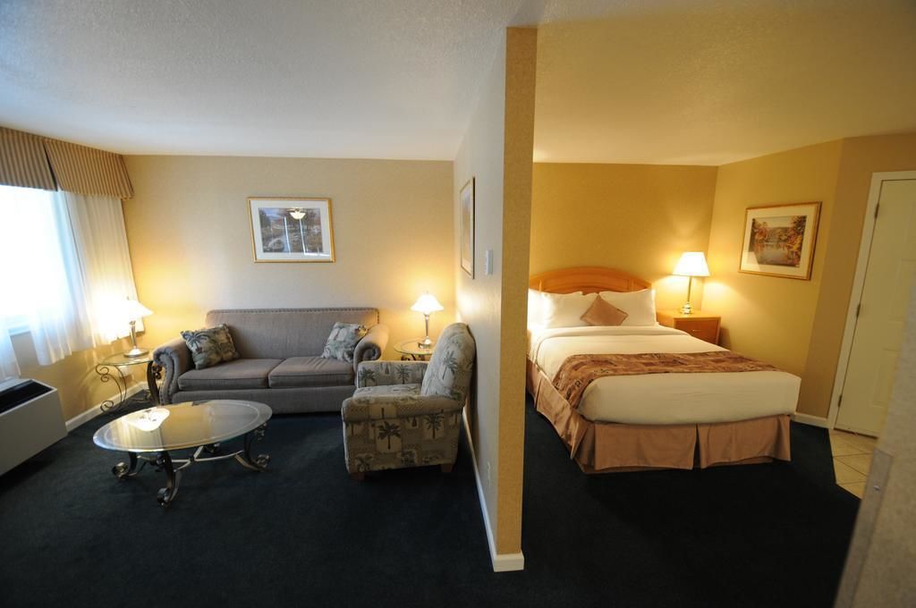 suite, 1 queen bed, non smoking, kitchenette (oversized room) | living area | 42-inch flat-screen tv with digital channels, tv, pay films