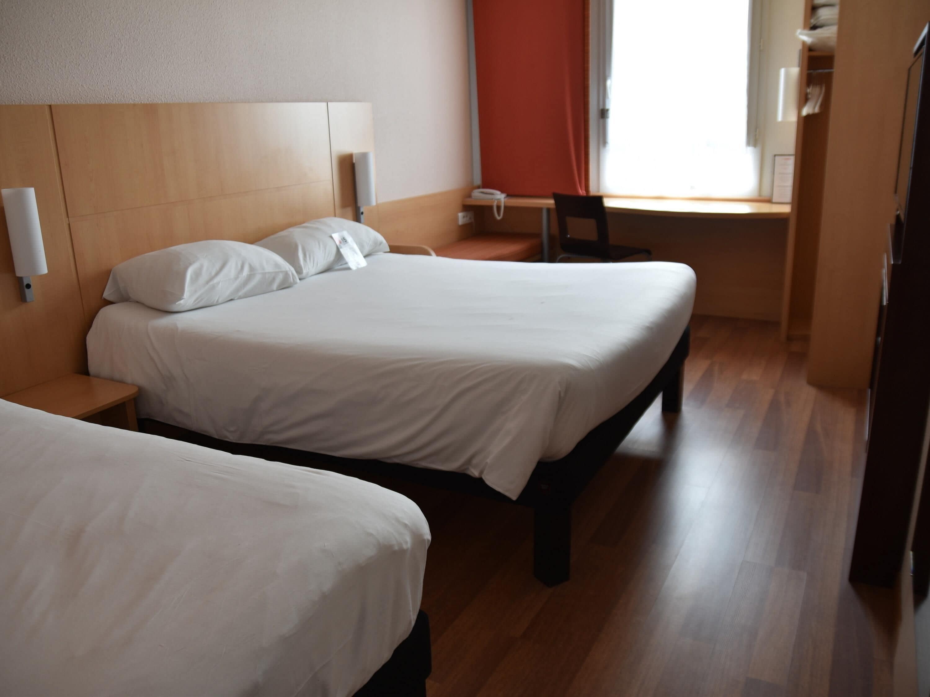 Standard Room, Multiple Beds | In-room safe, desk, free WiFi, bed sheets