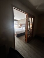 Suite, 1 King Bed with Sofa bed, Non Smoking | Hypo-allergenic bedding, desk, blackout drapes, iron/ironing board