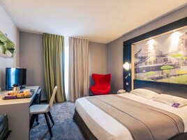 Ropa de cama de alta calidad y minibar 