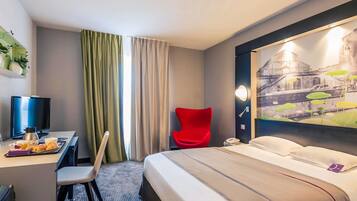 Superior kamer, 1 tweepersoonsbed | Luxe beddengoed, een minibar, een kluis op de kamer, een bureau