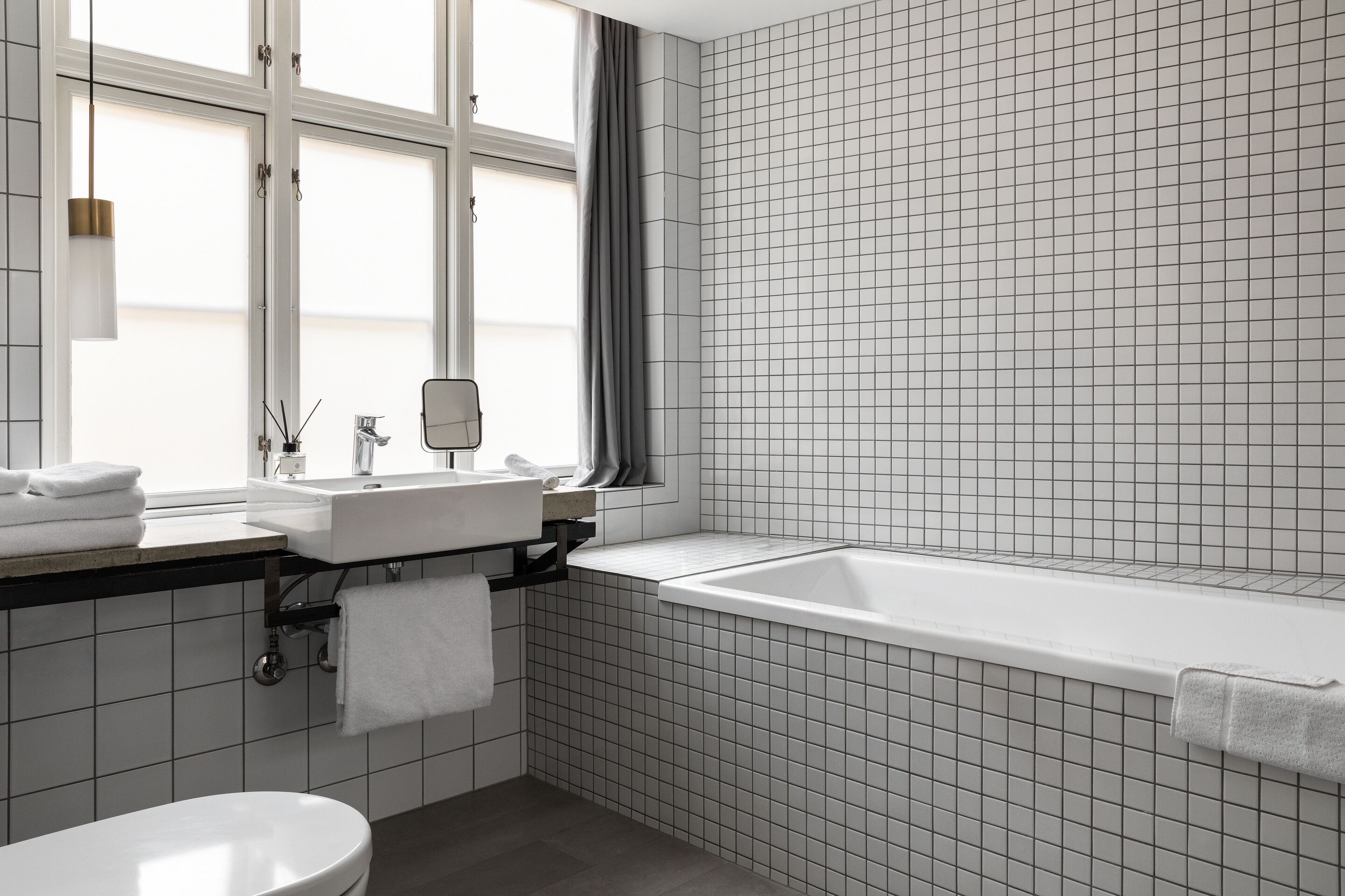 suite | bathroom | designer toiletries, hair dryer, towels, soap