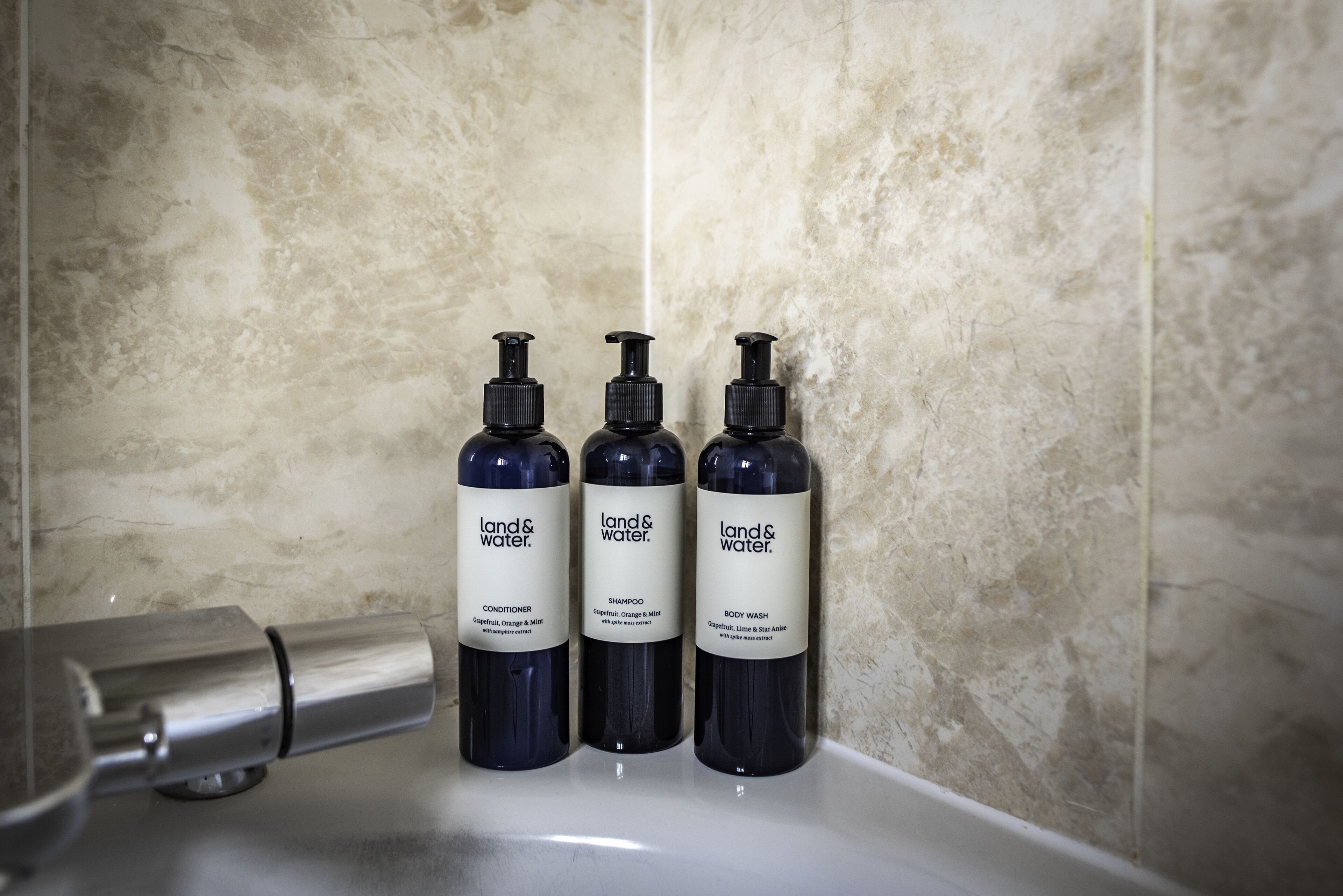 combined shower/bathtub, hair dryer, bathrobes, towels