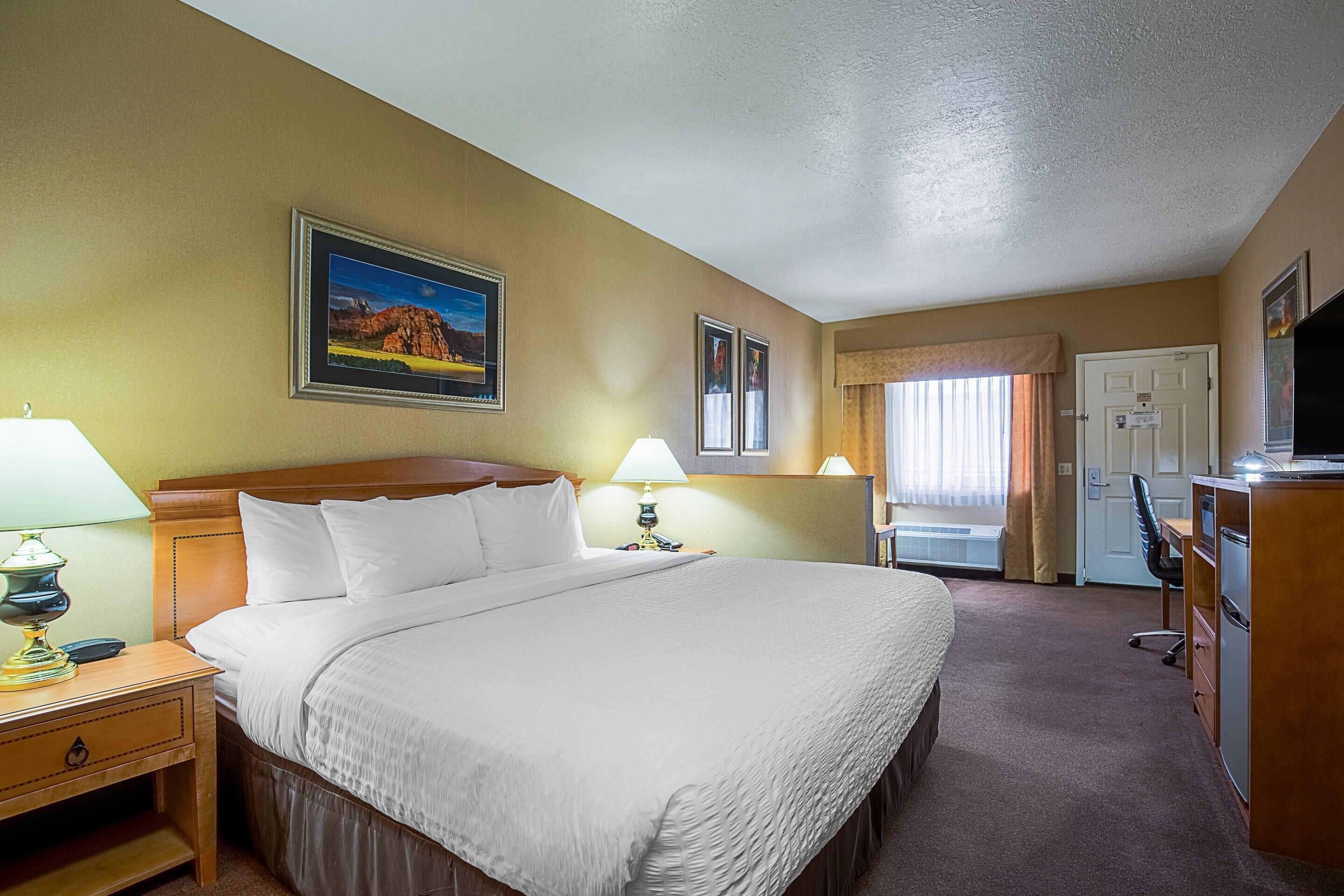 Premium bedding, down comforters, desk, blackout drapes