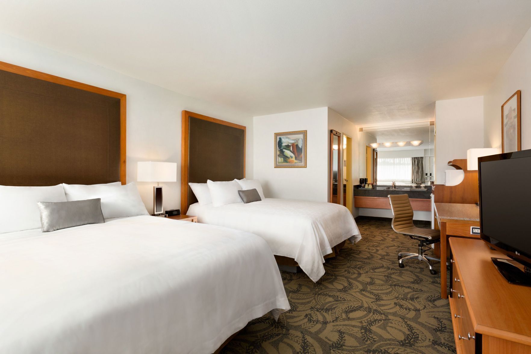 Pillow-top beds, in-room safe, blackout curtains, iron/ironing board