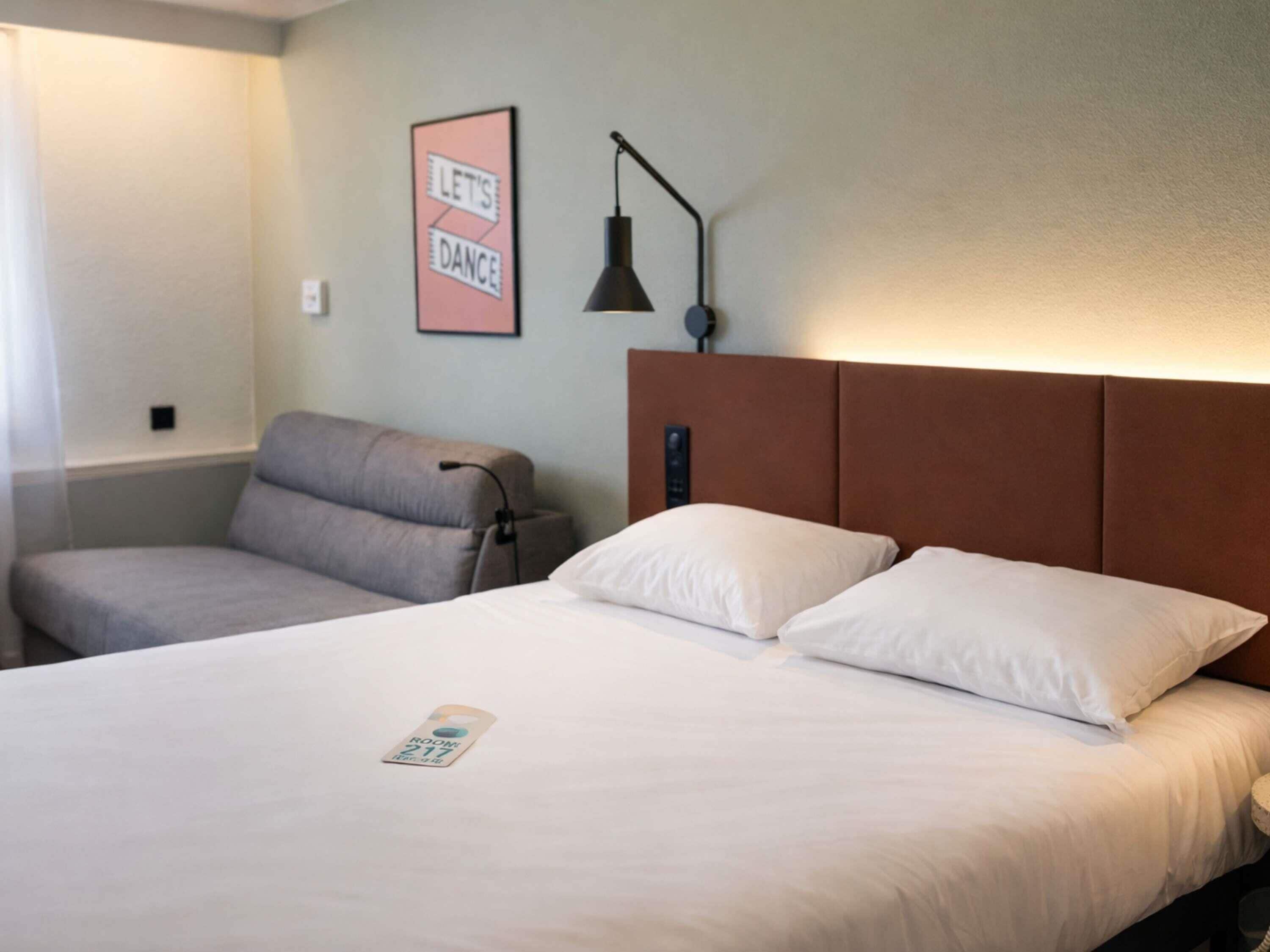 Quarto superior, 1 cama de casal e sofá-cama | Roupas de cama premium, escrivaninha, espaço de trabalho para notebook