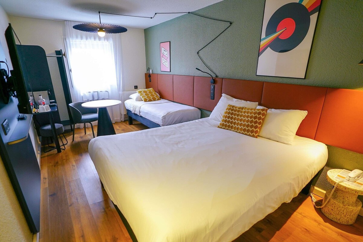 Premium bedding, desk, laptop workspace, blackout curtains