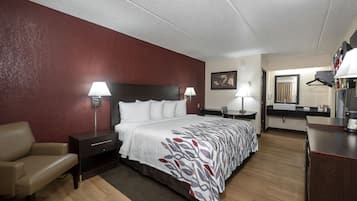 Desk, laptop workspace, blackout curtains, iron/ironing board