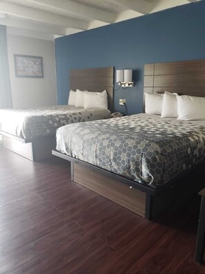 Pillowtop beds, iron/ironing board, free WiFi, bed sheets