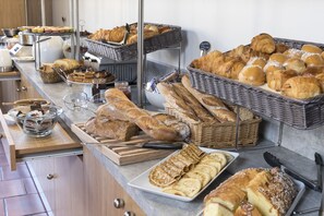 Daily buffet breakfast (EUR 18 per person)
