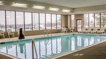 Indoor pool, open 10:00 AM to 10:00 PM, pool loungers