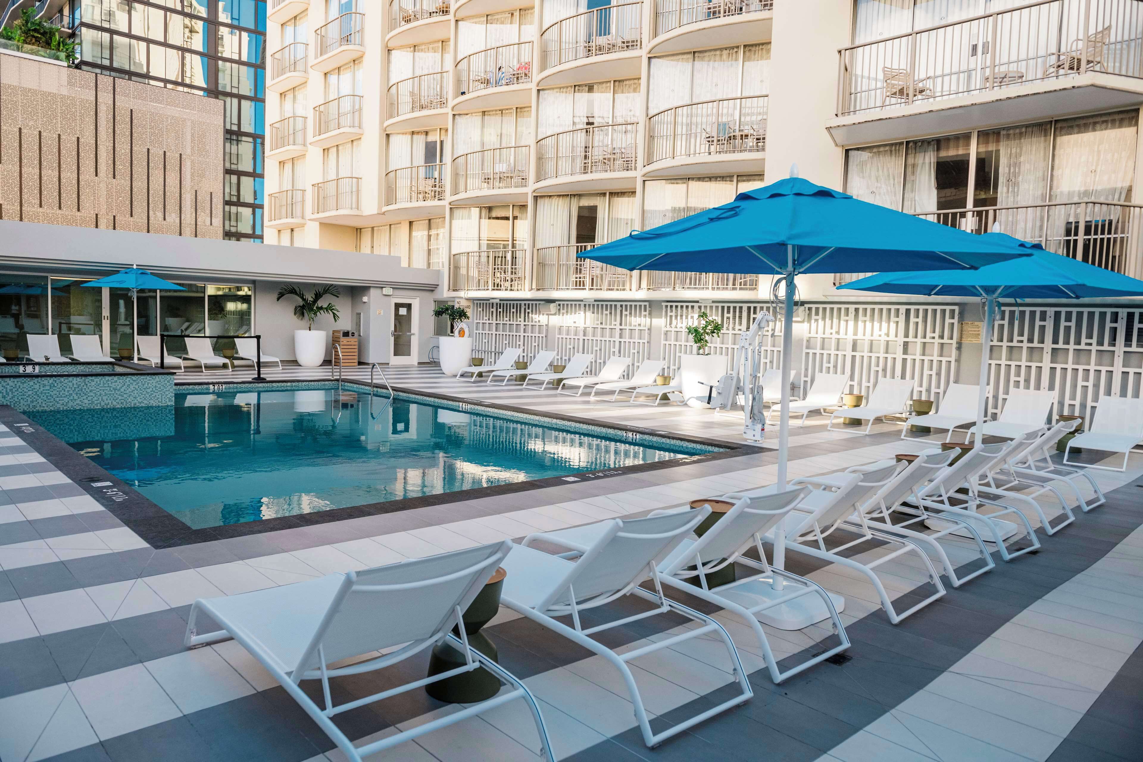 Outdoor pool, free cabanas, pool umbrellas