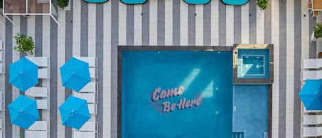 Outdoor pool, free cabanas, pool umbrellas