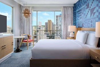 Hypo-allergenic bedding, in-room safe, desk, blackout drapes at OUTRIGGER Waikiki Paradise Hotel