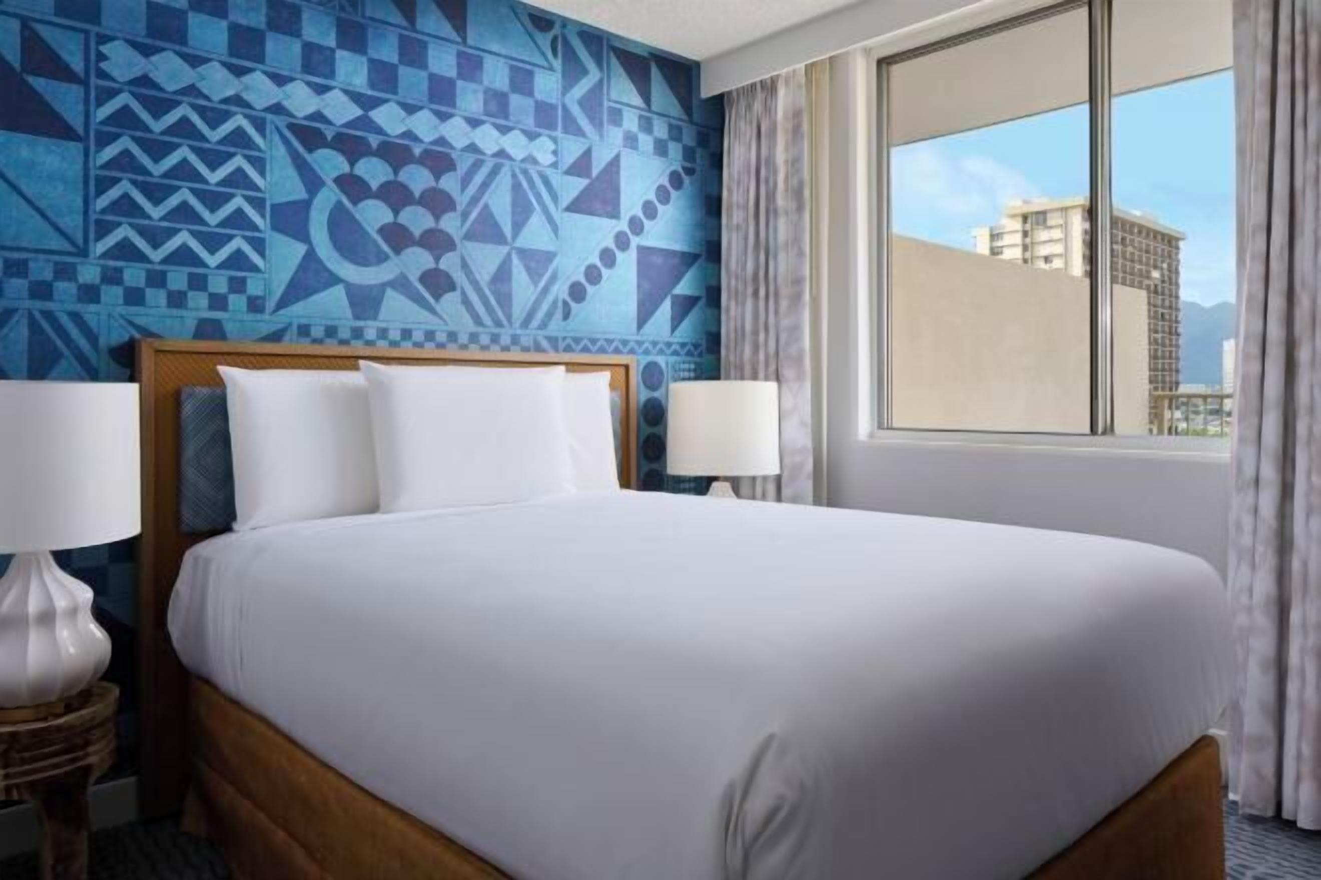 Hypo-allergenic bedding, in-room safe, desk, blackout drapes