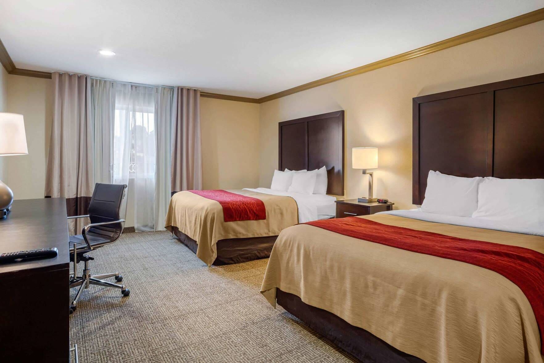 Premium bedding, pillowtop beds, desk, laptop workspace