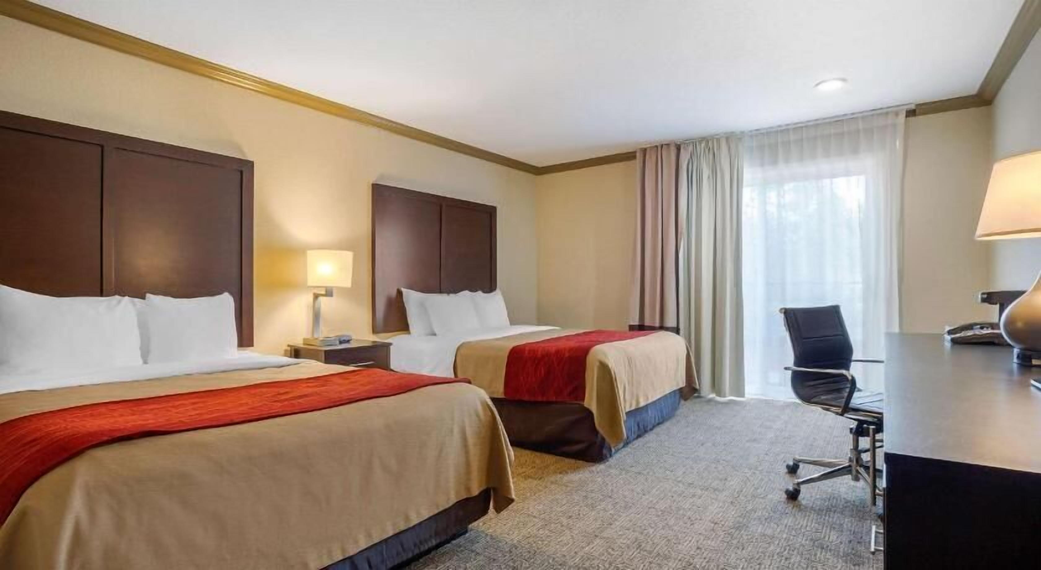 Premium bedding, pillowtop beds, desk, laptop workspace