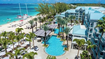 Outdoor pool, free pool cabanas, pool umbrellas