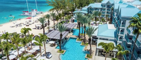 Outdoor pool, free pool cabanas, pool umbrellas