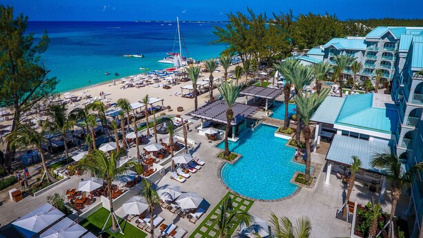 A resort with a pool, beach, and ocean view. - The Westin Grand Cayman Seven Mile Beach Resort & Spa (Seven Mile Beach)