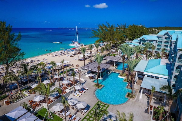 Outdoor pool, free cabanas, pool umbrellas