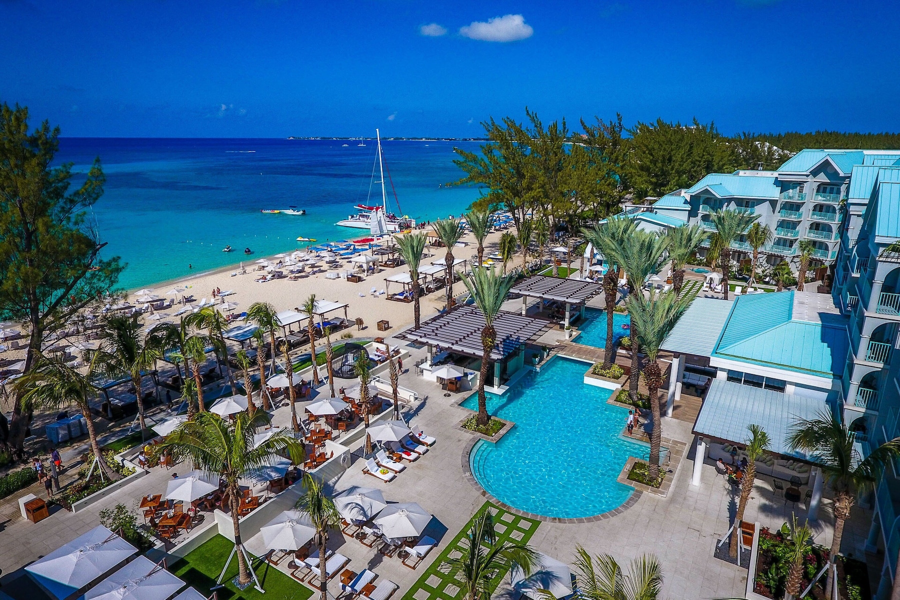 Outdoor pool, free cabanas, pool umbrellas