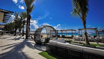 Outdoor pool, free pool cabanas, pool umbrellas