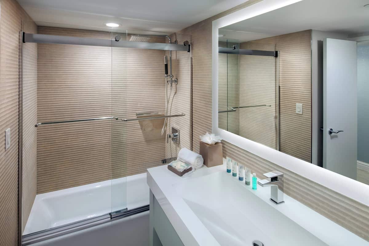 rainfall showerhead, designer toiletries, hair dryer, bathrobes