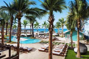 Outdoor pool, free cabanas, pool umbrellas