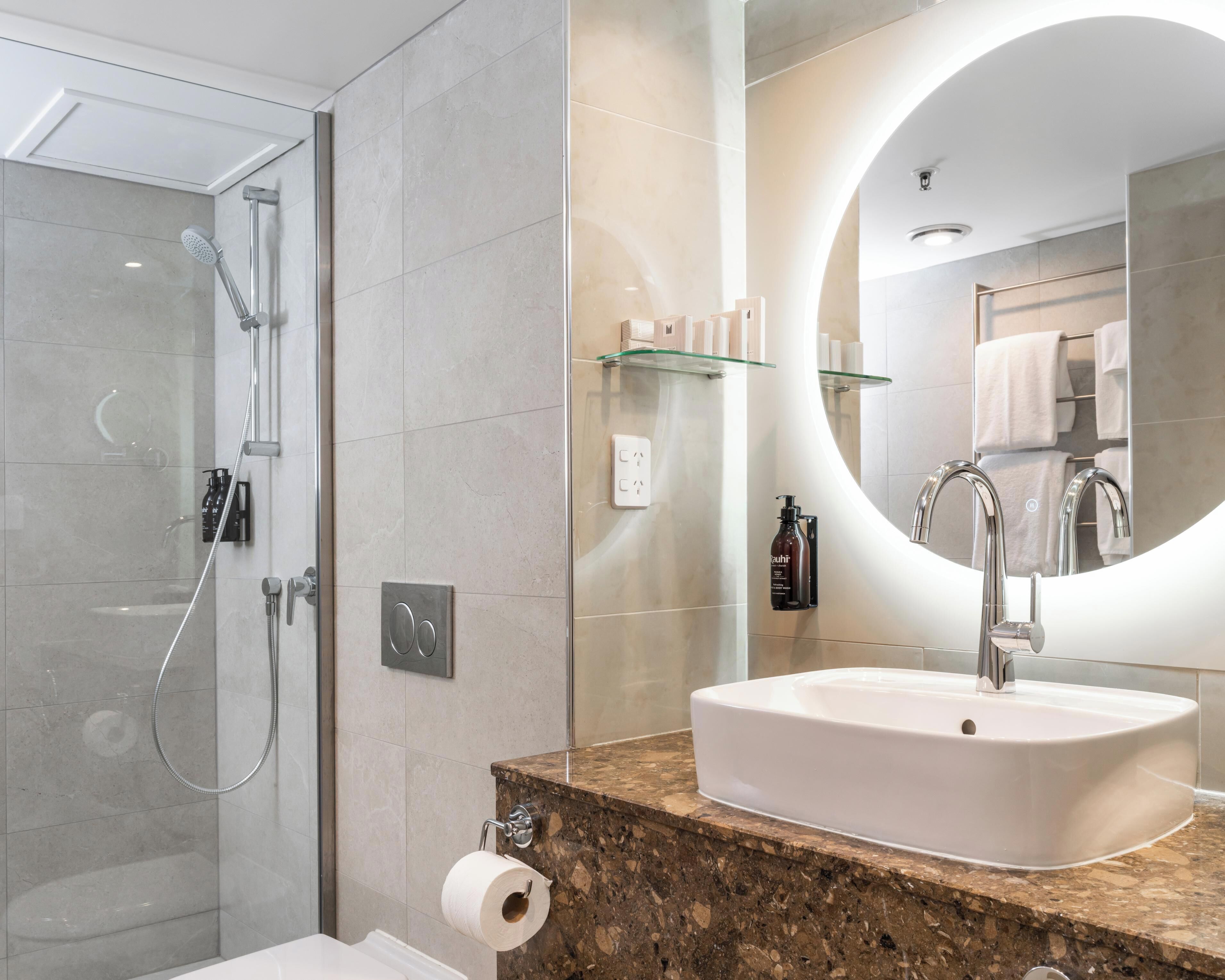 Shower, eco-friendly toiletries, hair dryer, slippers