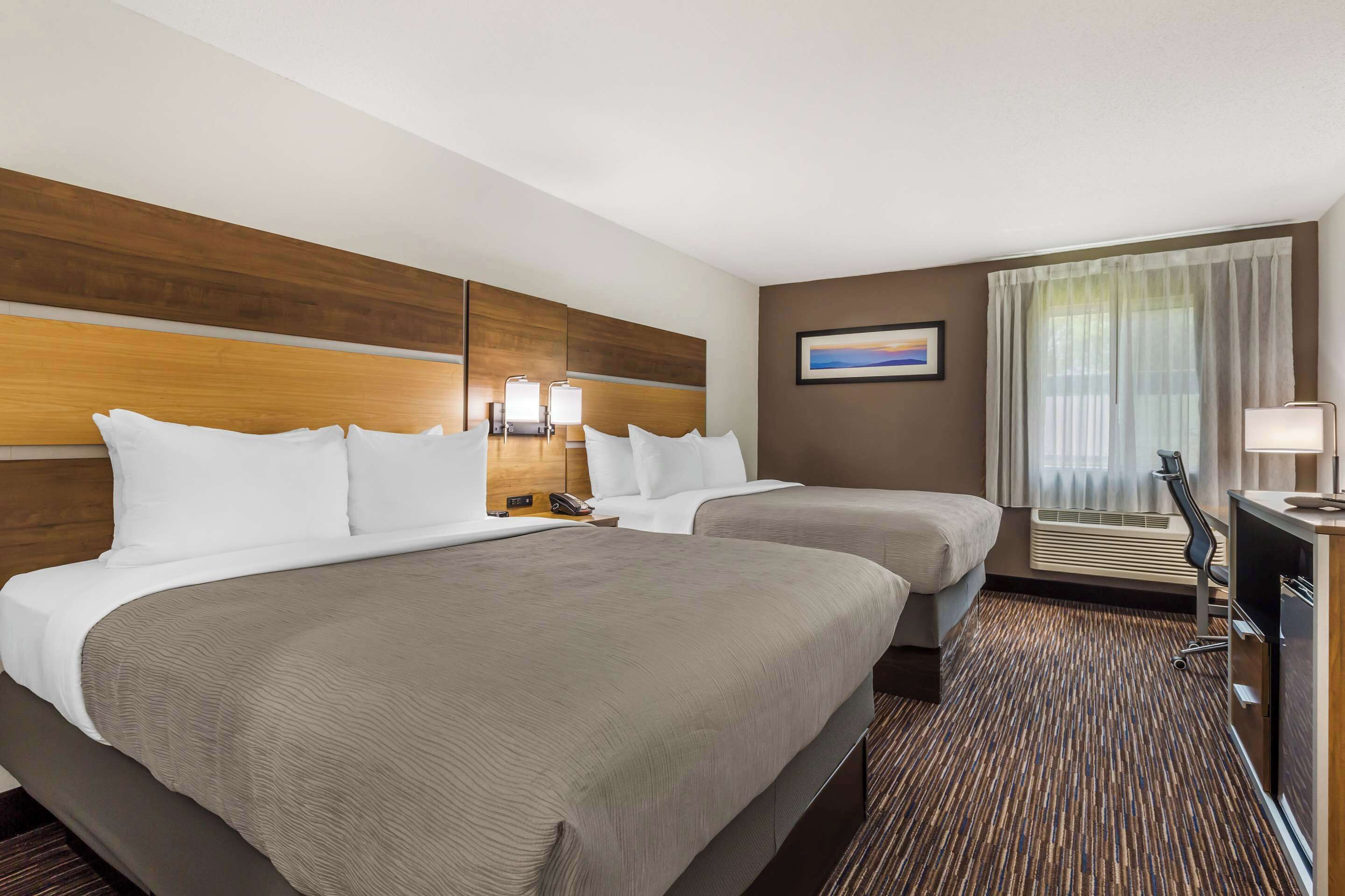 Standard Room, 2 Queen Beds, Non Smoking | Premium bedding, desk, iron/ironing board, free cribs/infant beds