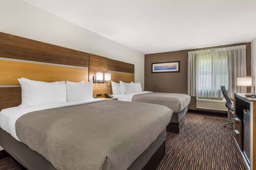 Standard Room, 2 Queen Beds, Non Smoking | Premium bedding, desk, iron/ironing board, free cots/infant beds