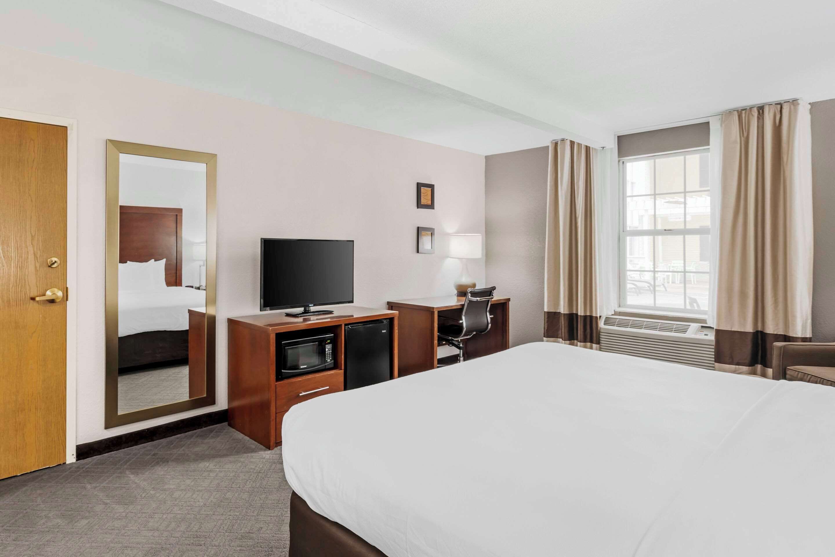 in-room safe, desk, blackout curtains, iron/ironing board