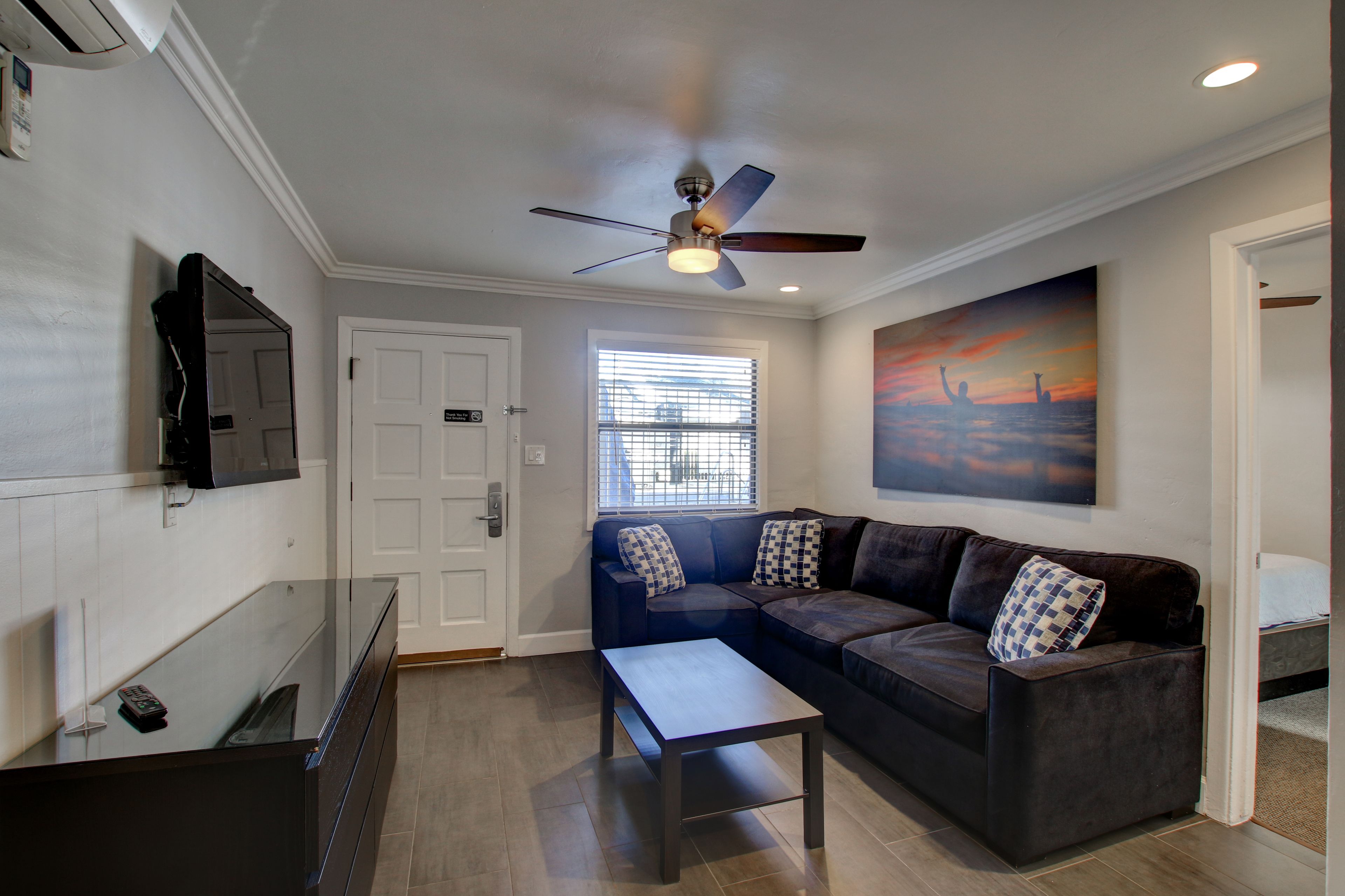 1 bedroom queen suite with kitchen | living area | tv