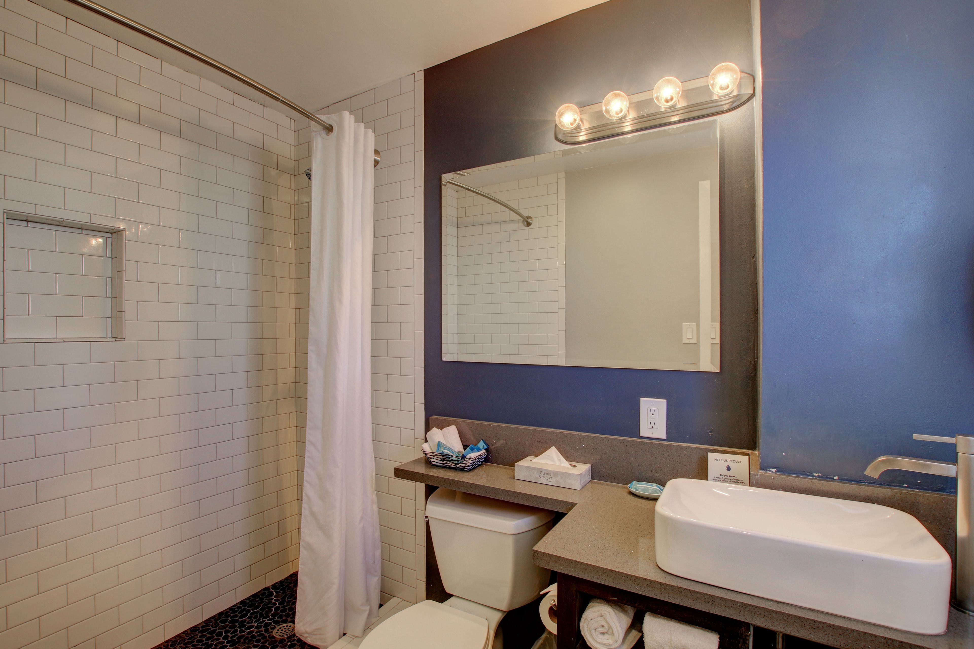 deluxe room, 2 queen beds | bathroom | free toiletries, towels