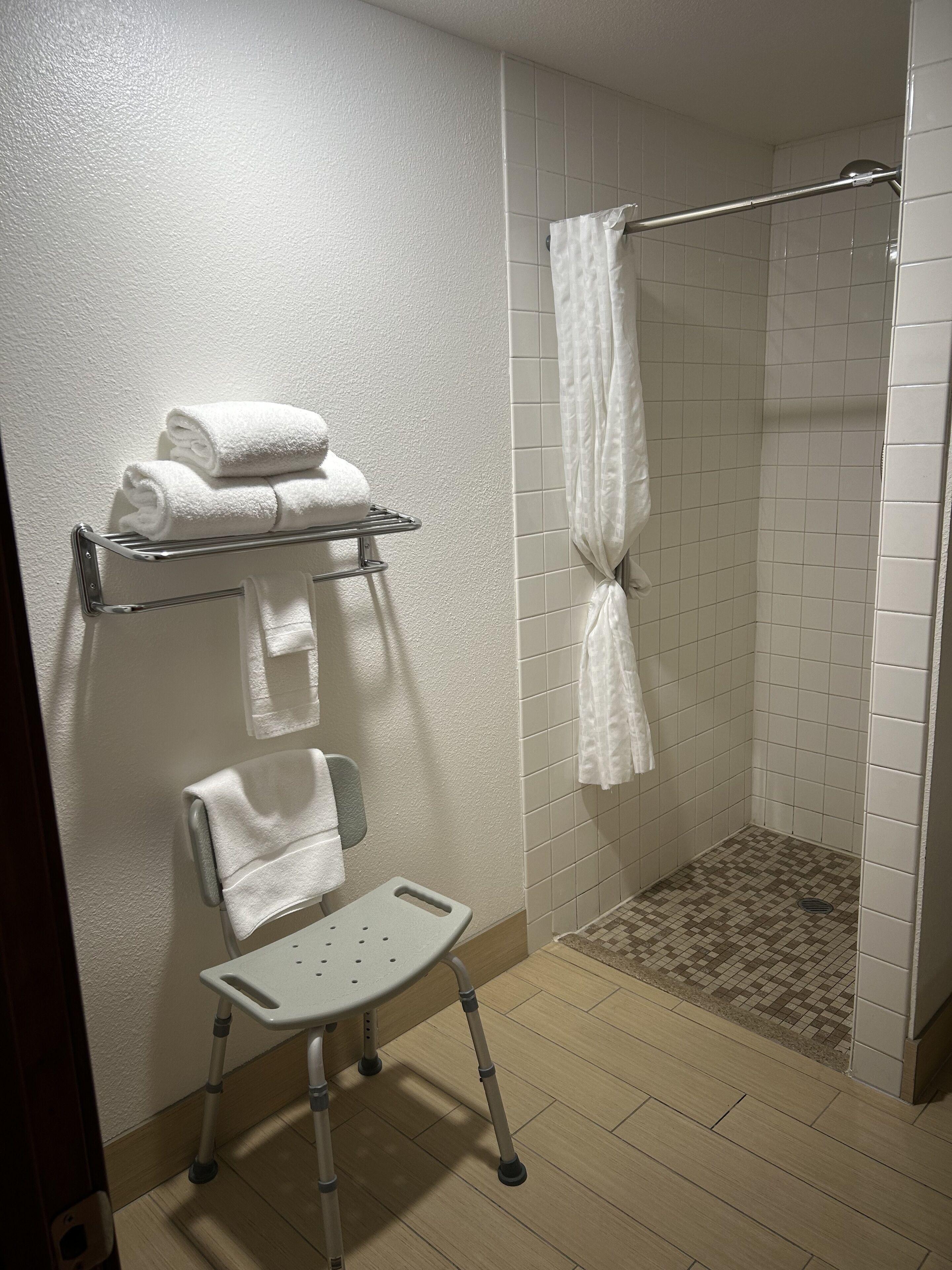 combined shower/bathtub, free toiletries, hair dryer, towels