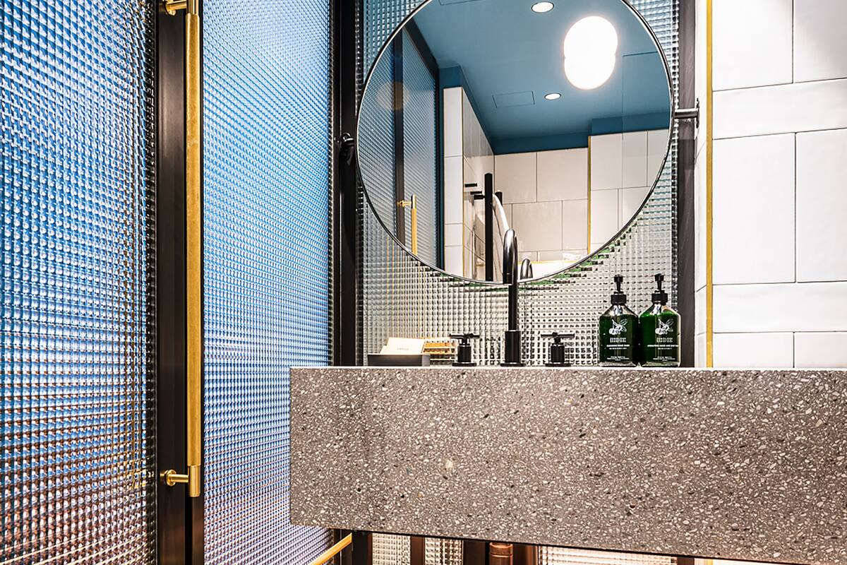 designer toiletries, hair dryer, bathrobes, slippers