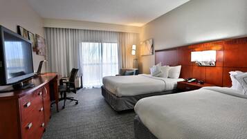 Desk, laptop workspace, blackout drapes, iron/ironing board