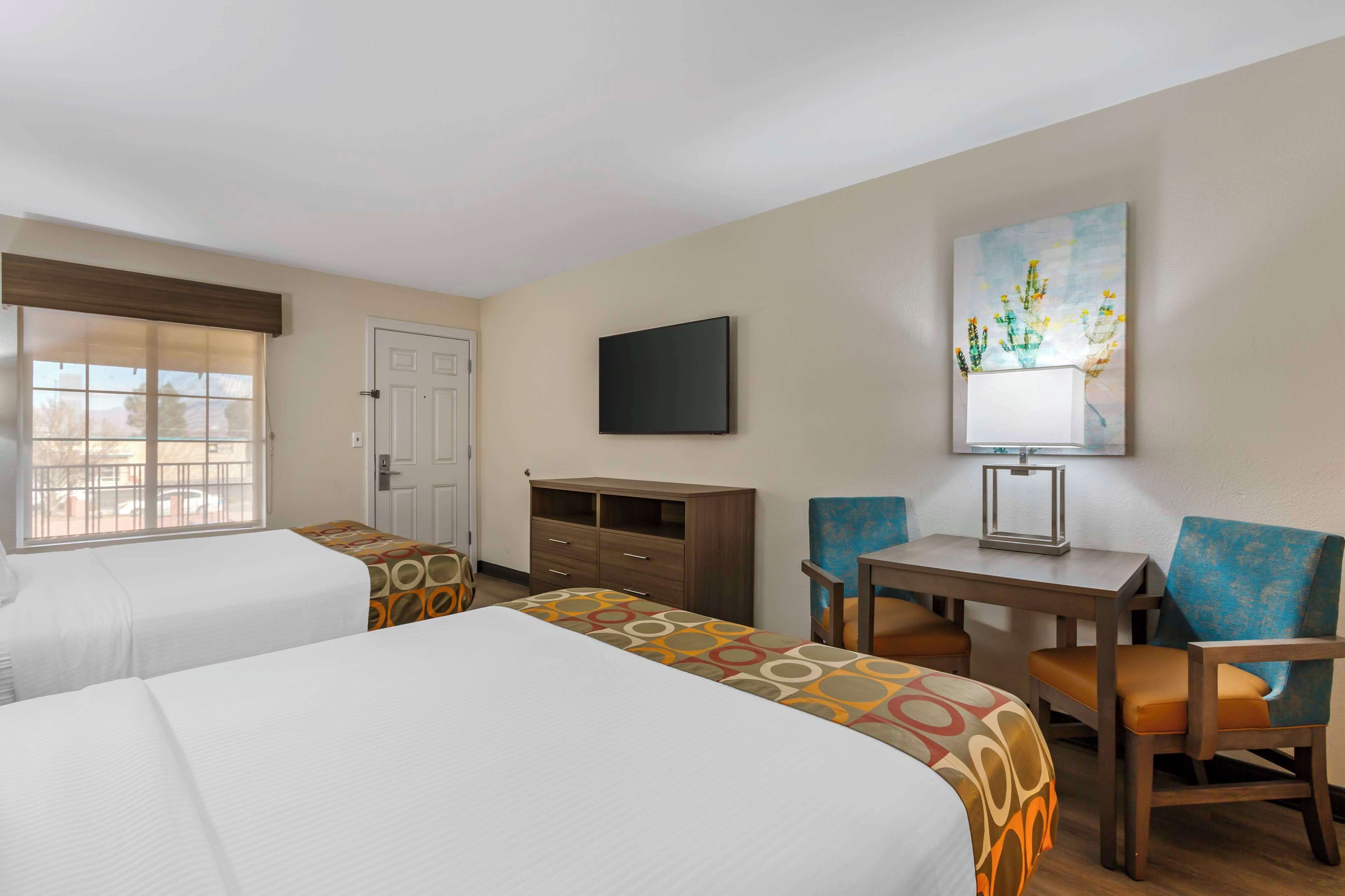 standard room, 2 queen beds, non smoking, refrigerator & microwave | 1 bedroom, iron/ironing board, bed sheets