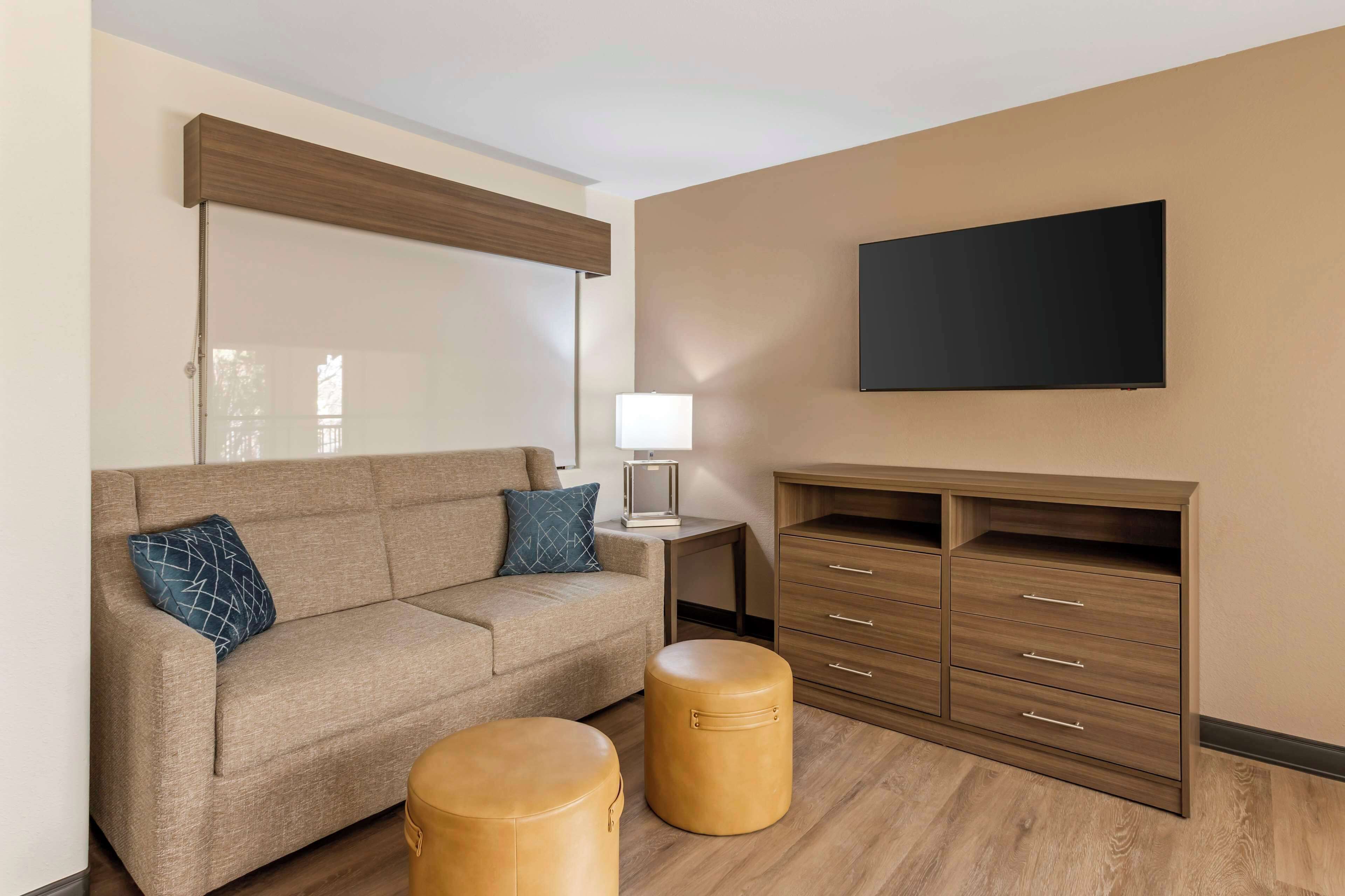 suite, 1 king bed, non smoking, refrigerator & microwave (separate living room;with sofabed) | 1 bedroom, iron/ironing board, bed sheets