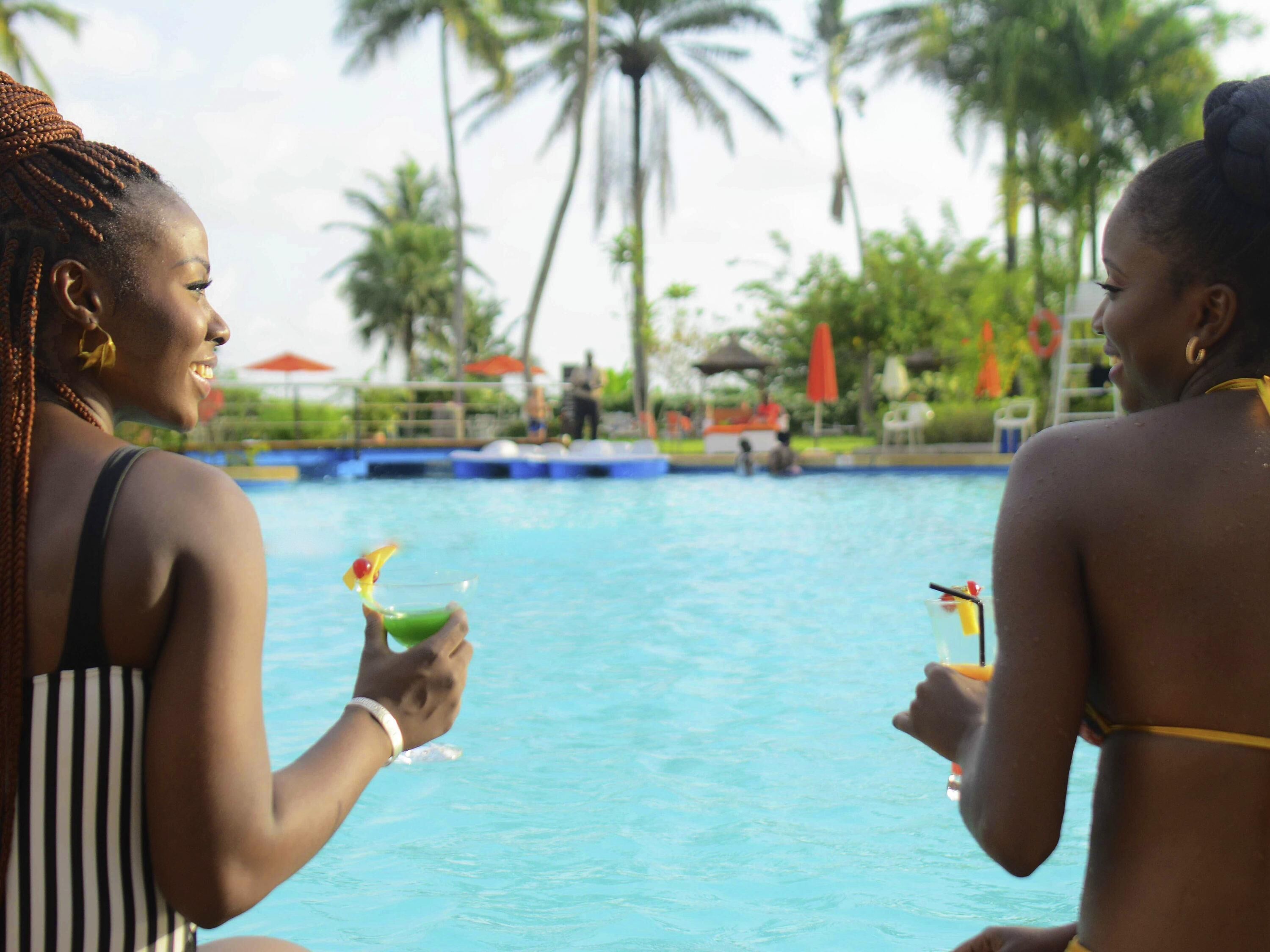 2 outdoor pools, pool umbrellas, pool loungers