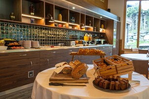 Daily buffet breakfast (EUR 18 per person)