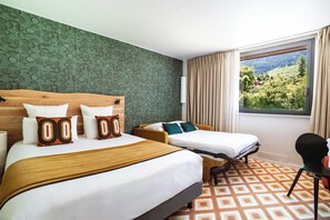 Premium bedding, blackout curtains, soundproofing, free cots/infant beds